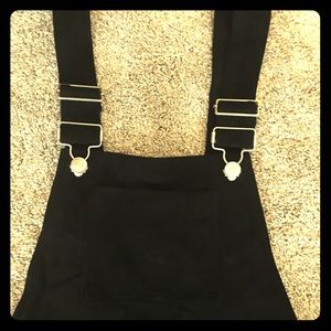 Black faux suede short overalls.NWT
